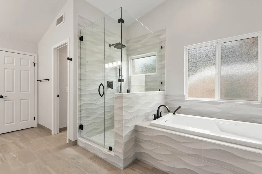 Acacia Project — primary bathroom remodel with glass shower and soaking tub, San Diego