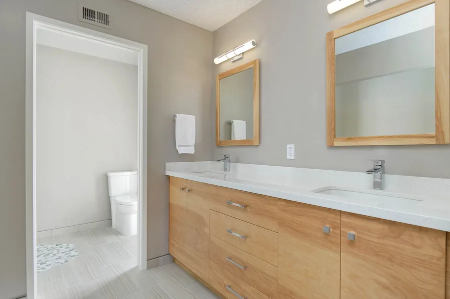 Beech Project — bathroom double-vanity remodel with wood cabinetry, San Diego